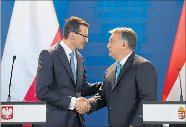  ?? [ AFP ] ?? Polens Ministerpr­äsident, Mateusz Morawiecki (links), und Ungarns Premier, Viktor Orban.´