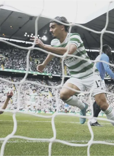  ?? ?? Jota celebrates scoring the opening goal for Celtic during yesterday’s Old Firm derby at Parkhead.