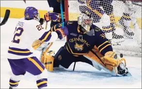  ?? David Zalubowski / Associated Press ?? Minnesota State forward Dallas Gerads, left, reacts as a shot by forward Cade Borchardt bounds past Quinnipiac goaltender Keith Petruzzell­i for the tying goal with 1:02 remaining in the third period of their NCAA West Regional semifinal game Saturday.