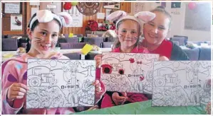  ??  ?? LITTLE BUNNIES: Jenna, left, Mia and Olivia MacPherson enjoyed the Easter activities held by Love Soup and Tokoroa Day.