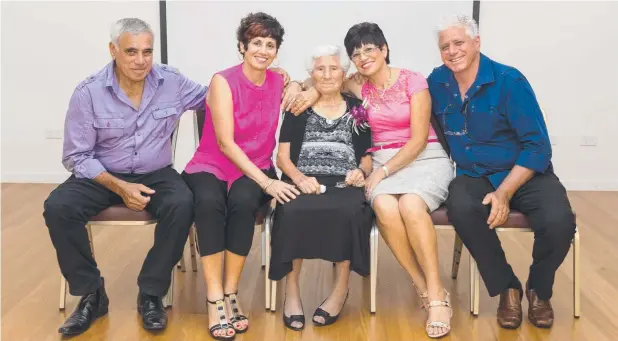  ??  ?? LOVING MATRIARCH: Santa Vasta surrounded by her children (from left) Joe, Sarina Parisi, Alfina Campbell and Sam.