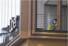  ?? Lea Suzuki / The Chronicle ?? Uber’s new home is clad in dark glass with bronze accents.