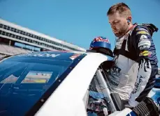  ?? Jonathan Bachman/Getty Images ?? William Byron enters his car during qualifying for the NASCAR Cup Series AutoTrader EchoPark Automotive 400 at Texas Motor Speedway on Saturday.