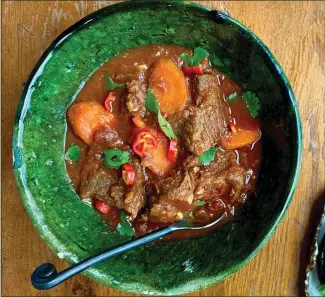  ?? COURTESY OF LYNDA BALSLEV ?? Made with apricots and rich spices, this lamb stew was inspired by a Moroccan tagine called mrouzia.