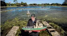  ?? BRADEN FASTIER/NELSON MAIL ?? Model maker and Nelson Society of Modellers member Noel Dyer with one of his boats that he can no longer sail.