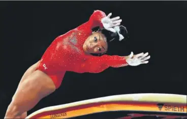  ?? REUTERS ?? Simone Biles won the vault for her 17th World Championsh­ip gold medal. However, she could finish only fifth in the uneven bars event which has been her weakest link.