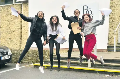  ?? Pictures: Kevin Fern ?? Celebratin­g A-level success at Balcarras School, Cheltenham, are right, Rhiannon Griffin, Megan Evans, Emily Griffin and Seren Mackenzie with, left, Thais Donovan and Yosra Soliman