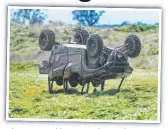  ??  ?? The upturned buggy at the crash scene.