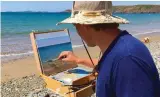  ??  ?? DJ painting at Newgale Beach, Pembroke
