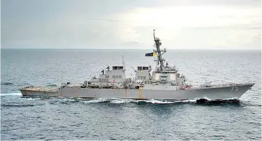  ??  ?? The guided-missile destroyer USS Decatur operates in the South China Sea in October 2016.(Petty Officer 2ndclass Diana Qui/afp/getty Images)