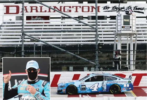  ?? BRYNN ANDERSON/AP PHOTOS ?? Kevin Harvick crosses the finish line to win the NASCAR race Sunday in Darlington, S.C.