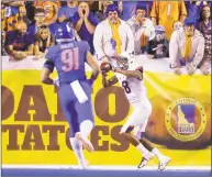  ?? Steve Conner / Associated Press ?? UConn tight end Aaron McLean (8) pulls in the ball for a touchdown against Boise State on Sept. 8.