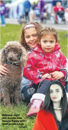  ?? FM4506299 ?? Bethany, eight and Amelia, four, Mencia-Kenny with their poodle Louis