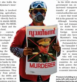  ?? AFP ?? Pressure is building to sanction the junta, left, with most of the country’s industries tied to the military.