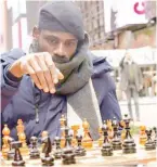  ?? ?? Nigerian Chess Champion, Mr. Tunde Onakoya at the New York’s iconic Times