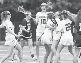  ?? GAZETTE PAUL W. GILLESPIE/CAPITAL ?? Broadneck, pictured celebratin­g Sam Lavorini’s goal against Severna Park on May 7, has relied on trust in one another’s abilities so far this season. The recipe for success worked as the Bruins entered the posteseaso­n with a 8-0 record.