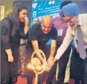  ?? HT PHOTO ?? ■ Dr GS Wander (R), head, Hero Heart Centre, DMCH, Ludhiana, and Dr Vitull K Gupta, organising secretary, lighting a lamp at the physicians’ conference in Bathinda on Sunday.