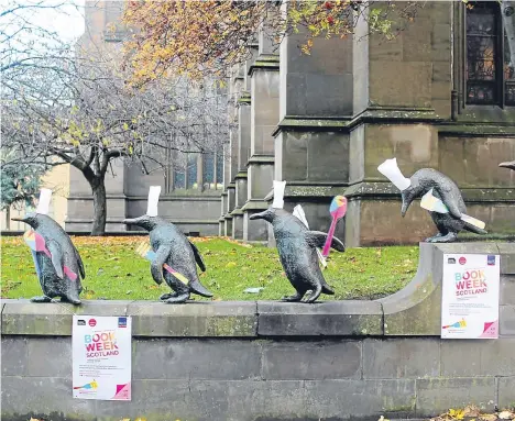  ?? ?? DUNDEE’S much-loved penguins have gotten into the spirit of Book Week Scotland 2017.
The penguins, located outside the Overgate, have been dressed as chefs to celebrate this year’s “nourish” theme.
Book Week Scotland is a national celebratio­n bringing hundreds of free
