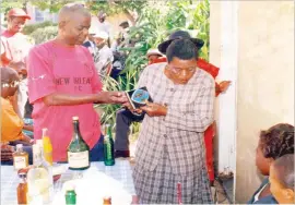  ??  ?? Ernest Mpala (left) ready to present her eldest child Precious with her 21st birthday key in year 2000 with wife Senzeni
