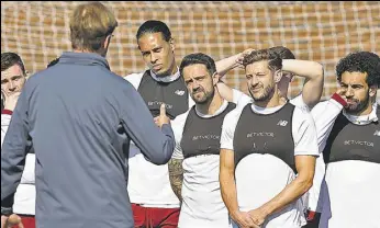  ?? GETTY ?? Liverpool manager Jurgen Klopp talks to his players at their training on Saturday.