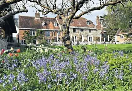  ?? ?? jg One of the rooms, Kingfisher, has a high vaulted ceiling, timber beams and views over the garden and down the river
If you are a fan of The Nare and Gravetye Manor, also privately owned and run, you will love The Priory