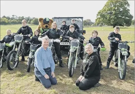  ??  ?? ‘LAPSE OF JUDGEMENT’
Cllr Sean Woodward with The Rockets motorcycle display and its former director, Joanne Bull