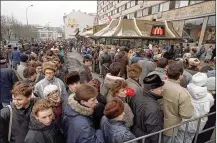  ?? AP FILE PHOTO ?? Hundreds line up at the first Mcdonald’s restaurant to set up shop in the Soviet Union on its opening day in Moscow on Jan. 31, 1990. The fast food chain has shut down its 850 restaurant­s.