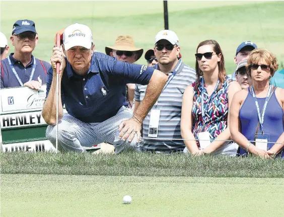  ?? RICK BARBERO/THE REGISTER-HERALD ?? All eyes will be on Davis Love III on Sunday at the Greenbrier Classic as he attempts to become the oldest winner in PGA Tour history at the event in White Sulphur Springs, W.Va. Love finished Saturday four shots off the lead.