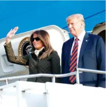  ?? THE ASSOCIATED PRESS ?? President Donald Trump and first lady Melania Trump arrive onAir Force One at Glasgow Prestwick Airport in Scotland on Friday. Trump returns to Scotland, yet again mixing statecraft and business promotion.