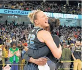  ?? WESCOTT/CHICAGO TRIBUNE STACEY ?? Chicago Sky players Courtney Vandersloo­t, left, and Astou Ndour-Fall celebrate after winning the WNBA championsh­ip 80-74 Sunday against the Phoenix Mercury.