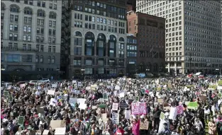  ?? ASSOCIATED PRESS ?? People gather on South Michigan Avenue for a concluding rally after a march in support of abortion rights Saturday in Chicago.