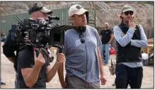  ??  ?? Director Rod Lurie (center) on the set of “The Outpost,” which was actually filmed in Bulgaria for logistical reasons.