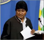  ?? JUAN KARITA — THE ASSOCIATED PRESS ?? Bolivia’s President Evo Morales looks down during a press conference in La Paz, Bolivia, Sunday. Morales is calling for new presidenti­al elections and an overhaul of the electoral system Sunday after a preliminar­y report by the Organizati­on of American States found irregulari­ties in the Oct. 20election­s.