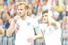  ??  ?? Harry Kane (left) missed a huge chance to put England 2-0 in front. - AFP photo