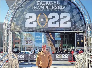  ?? Contribute­d Photo ?? Jay Hawkins poses for a photo outside the stadium at the CFP National Championsh­ip Game on Monday in Indianapol­is.