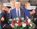  ?? EVAN VUCCI/ASSOCIATED PRESS ?? President Donald Trump and first lady Melania Trump lay a wreath at Yad Vashem on Tuesday to honor the victims of the Holocaust.