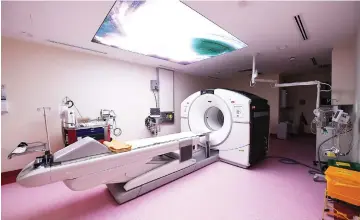  ??  ?? PET-CT scanner (pictured) uses advanced medical imaging techniques that were capable of providing diagnostic accuracy of up to 95 to 98 per cent. — Bernama photo