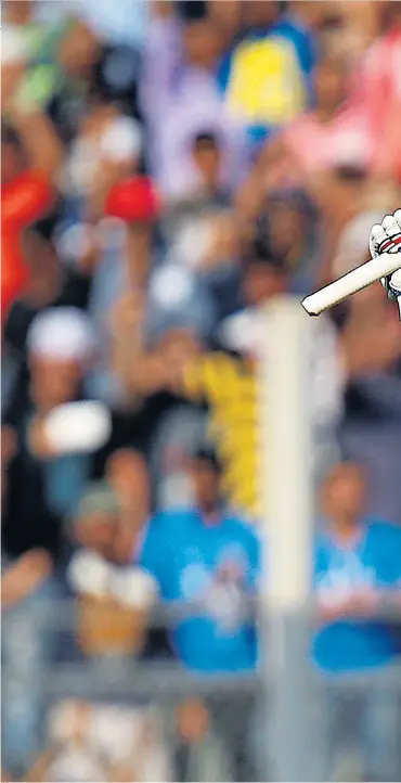  ??  ?? Man of the moment: Virat Kohli celebrates his century that put India in command