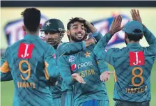  ?? AFP ?? Shadab Khan, centre, is No 2 in world T20 bowling rankings