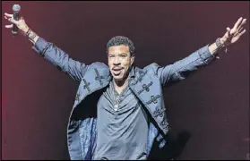  ??  ?? ABOVE: Lionel Richie will join Mariah Carey for a 2017 tour that plays Philips Arena in August.