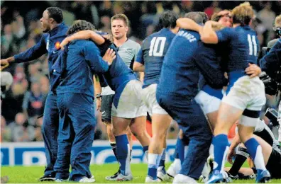  ?? Photo / NZ Herald ?? All Blacks captain Richie McCaw looks on in disbelief as the French players celebrate after the 2007 Rugby World Cup quarter-final.