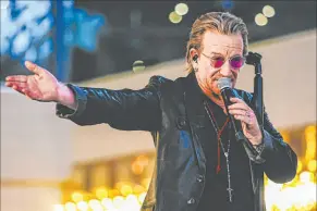  ?? Madeline Carter Las Vegas Review-journal ?? Bono of U2 performs in front of the Plaza in September. U2 has added four more dates at the Sphere as part of its venue launch.