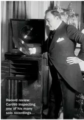  ??  ?? Record review: Caruso inspecting one of his many solo recordings…