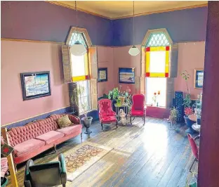  ?? CARLA ALLEN PHOTO ?? Shawna and her husband Nick have transforme­d a gothic revival-style building on Main Street, built in 1888, into the Steampunk'd Salon & Gallery. In addition to being a hair salon, the space is used to host concerts and special events (pre-pandemic).