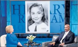  ??  ?? FOR SHOW: Hillary Clinton puts on an act on the “Steve Harvey Show” in February. Actress Brennan Leach (below) asks an allegedly staged question.