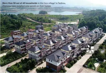  ??  ?? More than 50 out of 60 households in this “eco-village” in Taizhou, Zhejiang, have installed solar panels on their homes