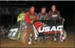  ?? RICH KEPNER - FOR DIGITAL FIRST MEDIA ?? Race winners Ryan Godown, left, Alex Bright, center, and Brett Arndt pose together in victory lane at Big Diamond on May 17.