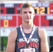  ??  ?? Barton on the medal stage at the Missouri Class 4 State Track and Field Championsh­ips after getting his fifth-place medal.