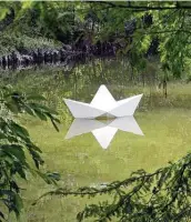  ??  ?? “Paper Navigator” seems to be part of nature as “Origamiint­hegarden2” makes its Texas debut.