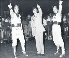  ??  ?? Insight Stirling Council convener Ian Wyles with the `Faces of Christmas Future) at the town’s ill-fated 1984 Christmas lights switch-on